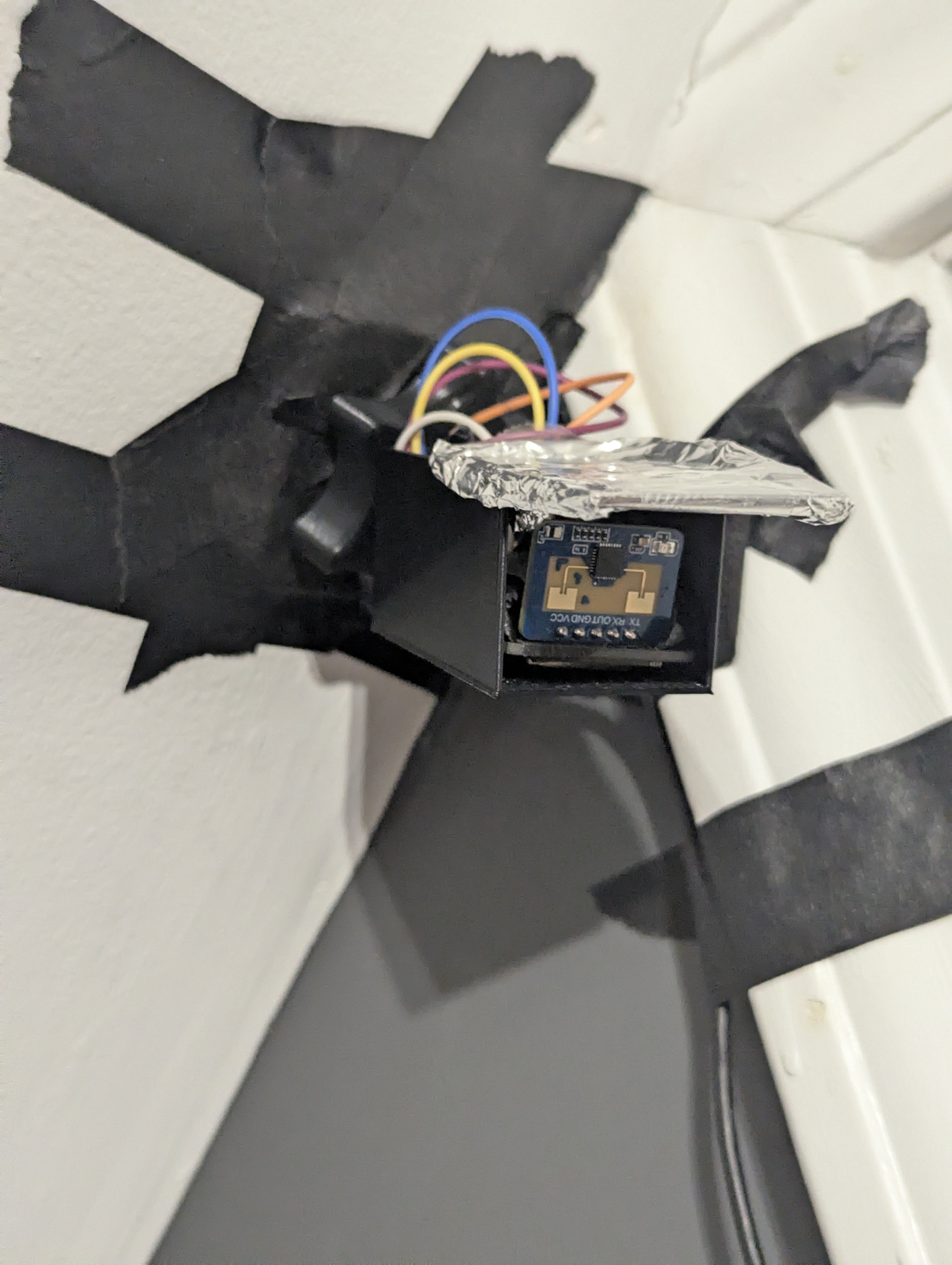 /assets/mmwavesensormountedonwallwithpainterstapeina3dprintedhousingthatlookslikeasecuritycamuglyandonlycouldbeinaroomthatnowomanwouldapproveof.jpg